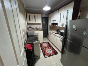 apartment with Garden & Private access in Gardenia City Compound for families only