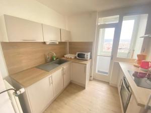 Appartements Au dessus du jardin - 185 : photos des chambres