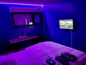 Maisons de vacances Gites Rozanna avec acces detente SPA JACUZZI : photos des chambres