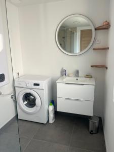 Appartements Le petit nouveau avec Jardin : photos des chambres