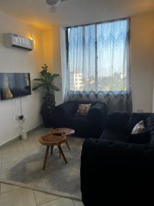 Accessible home near Mlimani City Mall with free WiFi & parking
