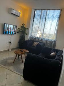 Accessible home near Mlimani City Mall with free WiFi & parking