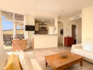 Ático con jacuzzi y vistas al mar