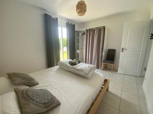 Maisons de vacances Maison pres de la plage Plouhinec : photos des chambres