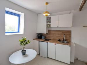 Appartements Barbieux , Au pied du metro : photos des chambres