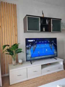 Nice and cozy flat with pool next to the beach