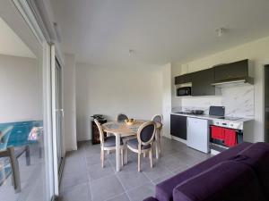 Appartements Cosy : photos des chambres