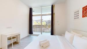 Vacationer Holiday Homes I Bright 1 Bedroom I Garden View I JVC