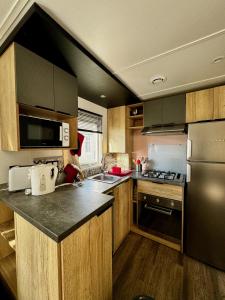 Campings Mobile-home 3 chambres chaleureux et calme : photos des chambres