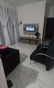 Casa com piscina em Itanhaém