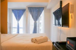 Minimalist and Restful Studio Tokyo Riverside PIK 2 Apartment By Travelio