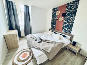 Appartements Vue sur Saint Quentin Un Sejour a Part : photos des chambres