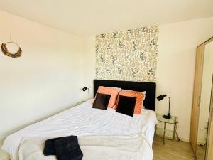 Appartements Vue sur Saint Quentin Un Sejour a Part : photos des chambres