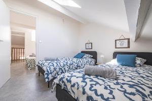 Maisons de vacances Tys Home, maison spacieuse avec parking : photos des chambres