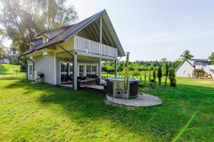 Namelis ant ežero kranto "Giliaus Elingas"