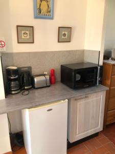 Appartements Magalas Top Apartment : photos des chambres