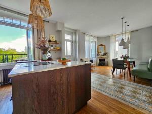 Maisons de vacances Grande maison de charme avec jardin : photos des chambres