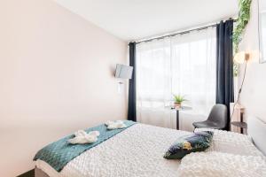 Maisons d'hotes Appartement spacieux, Paris centre 20min, Orly 20min, Disney 35min : photos des chambres