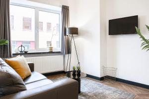 Spacious City Loft with Balcony & High-Speed Wi-Fi