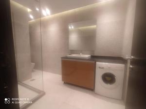 Ground floor hotel apartment with garden for rent in Westown Beverly Hills Compound