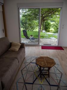 Appartements La maison sous le noyer : photos des chambres