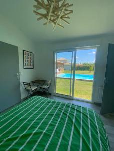 Maisons de vacances Appartement en pleine nature a 10 minutes de Dax : photos des chambres