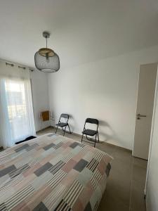 Appartements Appartement 2 chambres en rez de jardin avec piscine : photos des chambres