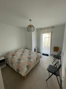 Appartements Appartement 2 chambres en rez de jardin avec piscine : photos des chambres