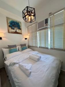 Studio One Condominium, Alabang - Bluu - Fiber Wi-Fi, Netflix-ready