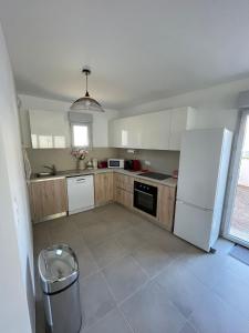 Appartements Appartement 2 chambres en rez de jardin avec piscine : photos des chambres