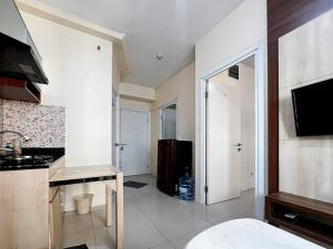 2BR Apt Green Pramuka with Pool & Wi-Fi by 2ndHome