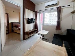2BR Apt Green Pramuka with Pool & Wi-Fi by 2ndHome