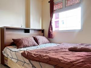 2BR Apt Green Pramuka with Pool & Wi-Fi by 2ndHome