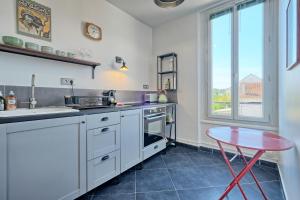 Appartements T2 Art Deco proche Disney-Paris-Parking : photos des chambres