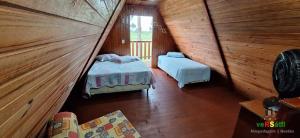 Chalé Caiu do Céu ll Wi-Fi Nômade Digital ll Táxi Fácil II Quiosque Churrasqueira ll Forno Microondas ll 6km da Estrada do Mar ll 7km Parque de Rodeio ll 8,1Km Prefeitura II 7,2Km UFRGS Litoral II 12km do Morro Borrúsia e Praias de Tramandaí