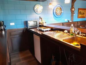 Onder de Blauwe Mantel