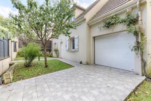 Maisons de vacances La Maison Pasteque - A 10 minutes de Disneyland : photos des chambres