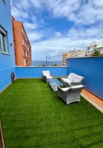 Apartamento a pie de playa con una amplia terraza - El Puertito