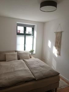 City-Apartment mit Parkplatz & Fahrradraum! Nur 300m zum Stadthafen