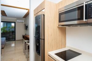 Menesse Liltowm rooftop con vista al mar