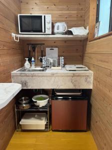 奄美ゲストハウス矢之脇町-Amami Guesthouse Yanowakicho-