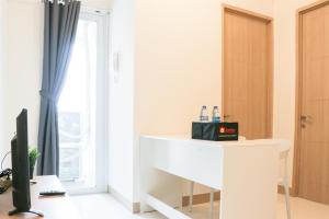 Cozy and Enjoy Living 2BR at Tokyo Riverside PIK 2 Apartment By Travelio