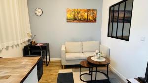 Appartements Cosy studio proche de la Defense Arena : photos des chambres