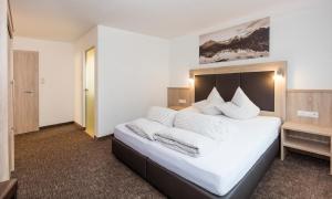 Three-Bedroom Apartment room in Gästehaus Emil