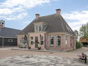 Group holiday home with gardens - Wierum