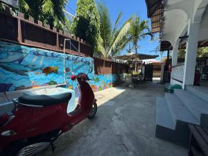 Tranquil Getaway Lilly Room, Dahlia Room, Aster Room and Poppy Room & Dive Center