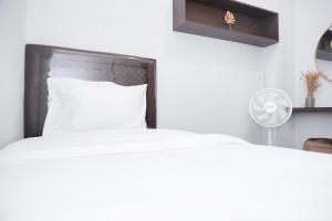 Nice and Simply 2BR at Green Bay Pluit Apartment By Travelio