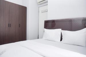 Nice and Simply 2BR at Green Bay Pluit Apartment By Travelio