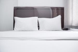 Nice and Simply 2BR at Green Bay Pluit Apartment By Travelio