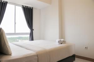 Warm and Cozy 2BR Tokyo Riverside PIK 2 Apartment By Travelio